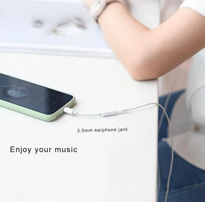 Lightning to Headphones Jack Adapter-White ABS Plastic.